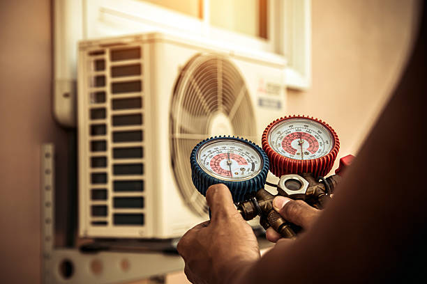 Professional Hvac technician working in Milford, NH